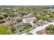 Aerial view highlighting the home, nestled among mature trees, providing privacy at 11175 Hyde St, Weeki Wachee, FL 34614