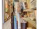 Organized walk-in closet with metal shelving, hanging rods, and storage bins to maximize space at 11175 Hyde St, Weeki Wachee, FL 34614