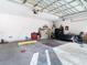 Spacious garage with storage solutions and ample room for parking and projects at 11175 Hyde St, Weeki Wachee, FL 34614