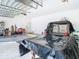 Garage featuring ample storage space and an open layout for versatile usage at 11175 Hyde St, Weeki Wachee, FL 34614