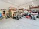 A garage with open space perfect for storing vehicles and equipment at 11175 Hyde St, Weeki Wachee, FL 34614