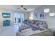 Comfortable living room with water view, modern furnishings, and stylish coastal decor at 225 Pompano Se Dr # C, St Petersburg, FL 33705