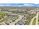 Aerial view of a residential community with lakes and nature preserves at 7048 White Willow Ct, Sarasota, FL 34243
