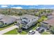Two-story home with a well manicured lawn and three-car driveway at 7048 White Willow Ct, Sarasota, FL 34243
