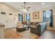 Cozy living room features hardwood floors, high ceiling, and lots of natural light at 901 W Plymouth St, Tampa, FL 33603