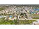 Aerial view of a residential neighborhood featuring one-story homes, well-maintained yards, and mature trees at 1112 21St E St, Palmetto, FL 34221