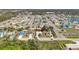 Aerial view of a residential neighborhood featuring one-story homes, well-maintained yards, and mature trees at 1112 21St E St, Palmetto, FL 34221