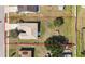 Overhead shot of a one-story home featuring a well maintained yard and an attached two-car garage at 1112 21St E St, Palmetto, FL 34221