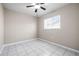 Bedroom featuring tile floors, a ceiling fan and a window with blinds at 1112 21St E St, Palmetto, FL 34221