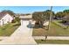 Charming one-story home with a well-manicured front yard, mature landscaping, and a two-car garage at 1112 21St E St, Palmetto, FL 34221