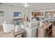 Cozy living area with modern furniture and views of the open kitchen at 2432 White Ladyfish Rd, Wimauma, FL 33598