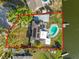 Aerial view of the property showcasing the pool, dock, and waterfront access at 5104 Saint Charles Pl, Tampa, FL 33610