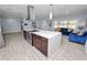 Spacious open floor plan with a gourmet kitchen island, perfect for entertaining and Gathering gatherings at 5104 Saint Charles Pl, Tampa, FL 33610