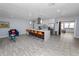 Open-concept kitchen with a large island, modern appliances, and stylish finishes at 5104 Saint Charles Pl, Tampa, FL 33610