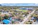 Charming neighborhood featuring a mix of cozy homes, a school and city views under a sunny blue sky at 923 26Th N St, St Petersburg, FL 33713