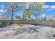 Enjoy the fenced backyard offering a mix of green space and brick-paved area for relaxation at 923 26Th N St, St Petersburg, FL 33713