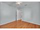 Light and airy bedroom featuring wood floors and neutral decor at 923 26Th N St, St Petersburg, FL 33713