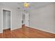 Cozy bedroom featuring hardwood floors and a ceiling fan at 923 26Th N St, St Petersburg, FL 33713