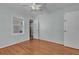 Serene bedroom featuring hardwood floors and ample natural light at 923 26Th N St, St Petersburg, FL 33713