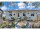 Beautiful house front with a walkway, charming flowerbeds, and natural light at 923 26Th N St, St Petersburg, FL 33713