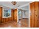 Cozy Gathering room boasts wood-paneled walls and easy access to the living area at 923 26Th N St, St Petersburg, FL 33713