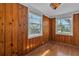Charming Gathering room features wood-paneled walls and ample natural light at 923 26Th N St, St Petersburg, FL 33713