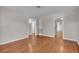 Spacious living room showcasing hardwood floors and seamless transitions to other rooms at 923 26Th N St, St Petersburg, FL 33713
