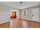 Inviting living room boasting gleaming hardwood floors and an abundance of natural light at 923 26Th N St, St Petersburg, FL 33713