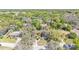 Aerial view of residential neighborhood with mature trees and landscaped yards at 1316 Cambron Dr, Valrico, FL 33596