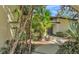 Welcoming entrance features beautiful landscaping, a sidewalk, and a gray front door at 1316 Cambron Dr, Valrico, FL 33596