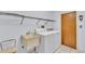 Laundry room features a utility sink, washing machine and a dryer at 1316 Cambron Dr, Valrico, FL 33596