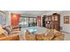 Bright living room with sliding glass doors that provide an abundance of natural light and pool views at 1316 Cambron Dr, Valrico, FL 33596
