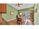 Bright and airy home office with wood floors and outdoor views at 1316 Cambron Dr, Valrico, FL 33596
