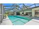 Stunning screened-in pool and patio area, perfect for outdoor entertaining and relaxation at 1316 Cambron Dr, Valrico, FL 33596