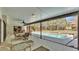 Enjoy this covered patio with a screened-in pool, perfect for relaxing and entertaining at 1316 Cambron Dr, Valrico, FL 33596