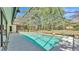 Inviting in-ground pool with screened enclosure, providing a private outdoor oasis at 1316 Cambron Dr, Valrico, FL 33596