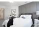 Bedroom with a gray accent wall, desk, carpeted floors, and ceiling fan at 2767 Walden Town Cir, Plant City, FL 33566