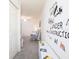 Bedroom with construction wall art, glider rocker, storage, and decor at 2767 Walden Town Cir, Plant City, FL 33566