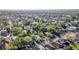 Wide aerial perspective presenting the home nestled within a tranquil, tree-filled community at 3105 N 17Th St, Tampa, FL 33605