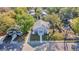 High angle shot of the home, showing the roof, yard and surrounding homes at 3105 N 17Th St, Tampa, FL 33605