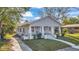 Beautiful single-story home offering a lovely front porch and well-maintained lawn at 3105 N 17Th St, Tampa, FL 33605