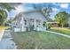 Charming single-story home featuring a welcoming front porch with classic white pillars at 3105 N 17Th St, Tampa, FL 33605