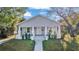 Inviting single-story home boasting a quaint front porch with traditional white columns at 3105 N 17Th St, Tampa, FL 33605