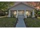 Charming bungalow with a classic covered front porch and well-manicured landscaping at 3105 N 17Th St, Tampa, FL 33605