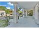 The porch is very long with white supports and is spacious at 3105 N 17Th St, Tampa, FL 33605