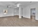 Inviting living area with ceiling fan and large windows, offering plenty of natural light at 3105 N 17Th St, Tampa, FL 33605
