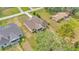 Aerial view of a home with green lawn in a neighborhood setting at 12500 Green Oak Ln, Dade City, FL 33525