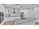 Modern kitchen featuring granite countertops, stainless steel appliances and subway tile backsplash at 12500 Green Oak Ln, Dade City, FL 33525