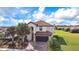 Stunning two-story home with a tile roof, lush landscaping, and a welcoming two-car garage at 6914 Quiet Creek Dr, Bradenton, FL 34212