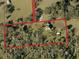 Aerial view showcasing property lines, home, and surrounding land at 8922 Pritcher Rd, Lithia, FL 33547